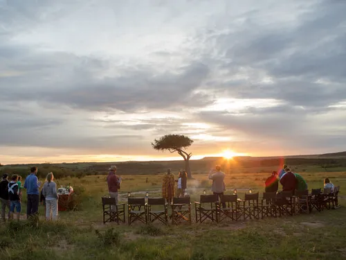 Sunset dining at a safari camp