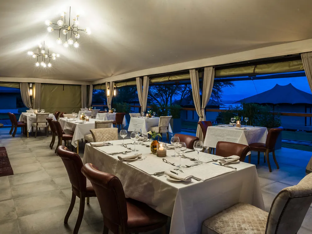 Dining area at a lodge overlooking the landscape
